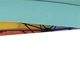 A zoomed in photo of an umbrella with a rainbow colored interior canopy.